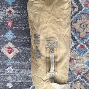 Heavy duty tan cotton military duffel bag. 100% cotton
